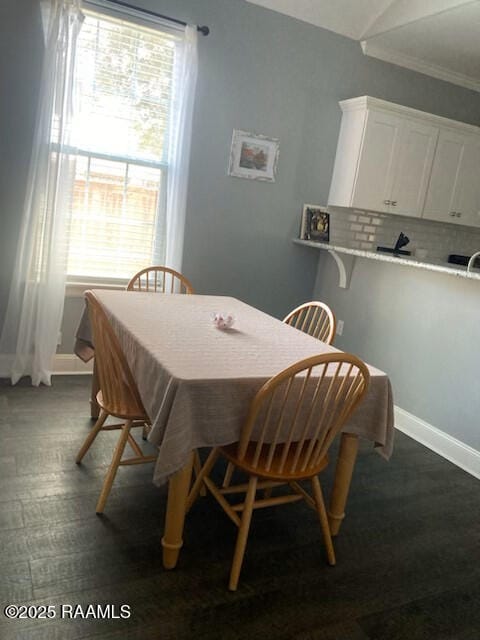 236 Chatrian St, Grand Coteau, LA 70541 - dining room featuring baseboards and ornamental molding