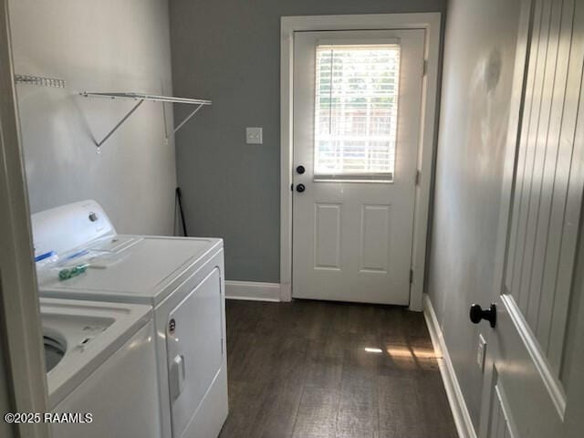 236 Chatrian St, Grand Coteau, LA 70541 - washroom with washing machine and clothes dryer, dark wood-style flooring, and baseboards