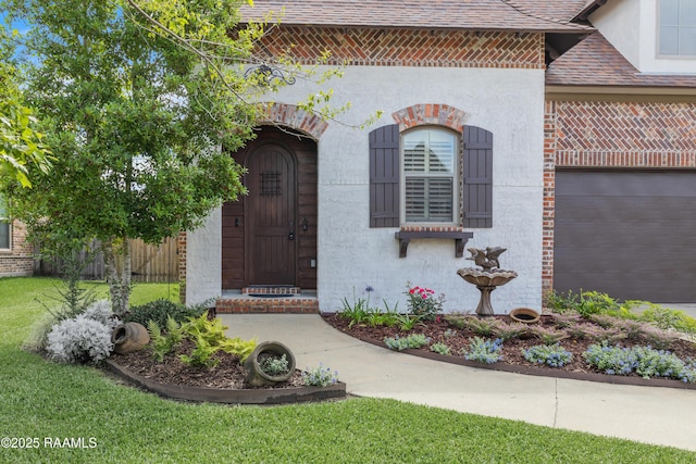 108 Autumnbrook Dr, Broussard, LA 70518 - entrance to property featuring stucco siding, brick siding, and roof with shingles