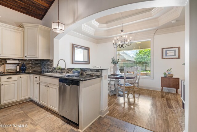 108 Autumnbrook Dr, Broussard, LA 70518 - kitchen featuring dishwasher, a sink, a chandelier, crown molding, and backsplash
