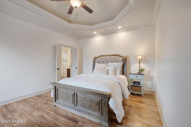 108 Autumnbrook Dr, Broussard, LA 70518 - bedroom featuring a raised ceiling, ornamental molding, wood finished floors, baseboards, and a ceiling fan