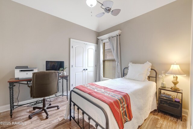 108 Autumnbrook Dr, Broussard, LA 70518 - bedroom with wood finished floors, a closet, baseboards, lofted ceiling, and ceiling fan