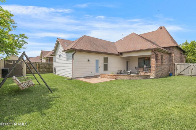 108 Autumnbrook Dr, Broussard, LA 70518 - rear view of house with a patio, a gate, roof with shingles, and brick siding