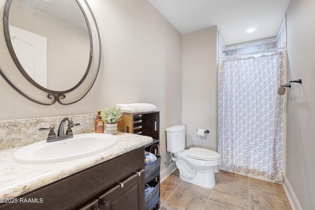 108 Autumnbrook Dr, Broussard, LA 70518 - full bathroom featuring vanity, toilet, a shower with shower curtain, and baseboards