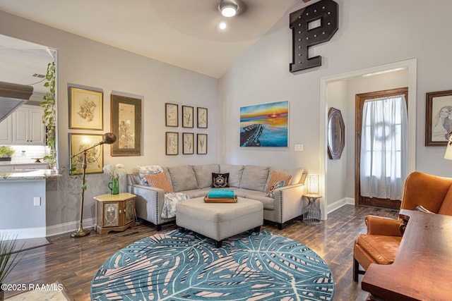 112 Sandhill Crane Dr, Lafayette, LA 70508 - living area with dark wood-style floors, baseboards, a ceiling fan, and high vaulted ceiling