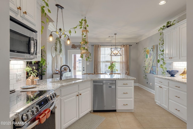 112 Sandhill Crane Dr, Lafayette, LA 70508 - kitchen with stainless steel appliances, a sink, backsplash, light tile patterned floors, and light stone counters