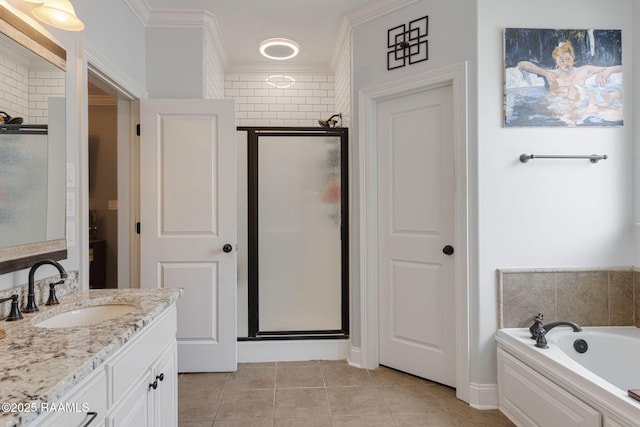 112 Sandhill Crane Dr, Lafayette, LA 70508 - bathroom featuring a stall shower, ornamental molding, tile patterned flooring, vanity, and a bath