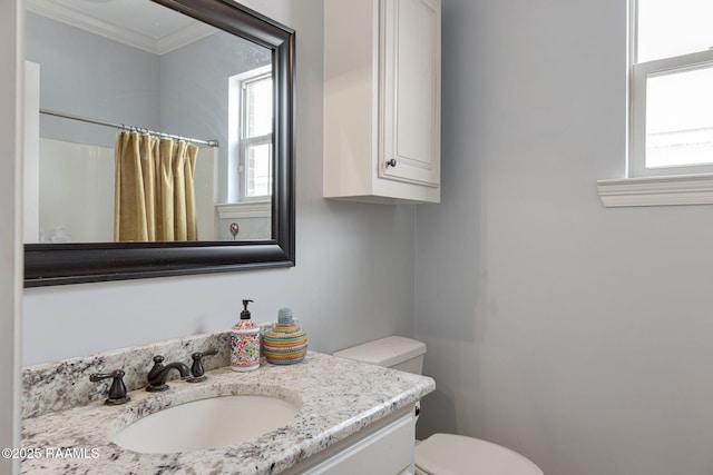 112 Sandhill Crane Dr, Lafayette, LA 70508 - full bath with plenty of natural light, toilet, ornamental molding, vanity, and curtained shower