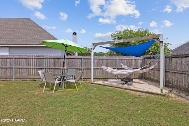 112 Sandhill Crane Dr, Lafayette, LA 70508 - view of yard featuring an outdoor fire pit and a patio