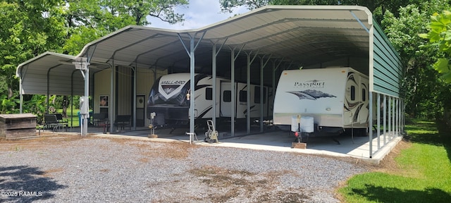 1462 Herman Dupuis Rd, Breaux Bridge, LA 70517 - view of parking / parking lot featuring a carport and gravel driveway