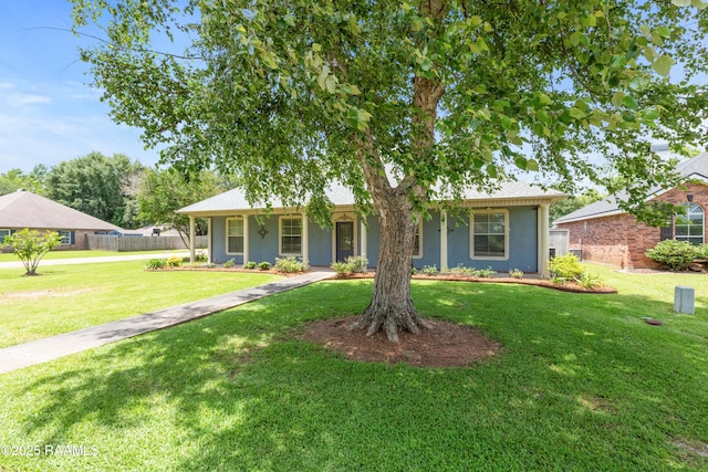 201 Rue Paon, Youngsville, LA 70592 - view of front of house with stucco siding