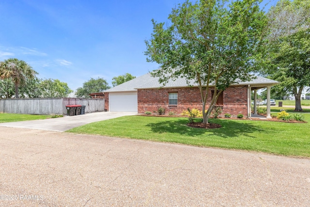 201 Rue Paon, Youngsville, LA 70592 - view of front facade featuring brick siding, concrete driveway, a garage, and a shingled roof