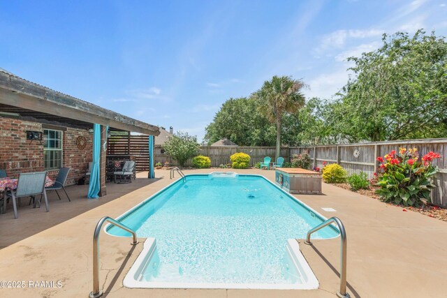 201 Rue Paon, Youngsville, LA 70592 - view of pool with a fenced backyard and a patio