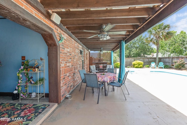 201 Rue Paon, Youngsville, LA 70592 - view of patio with ceiling fan, outdoor dining space, and a fenced backyard