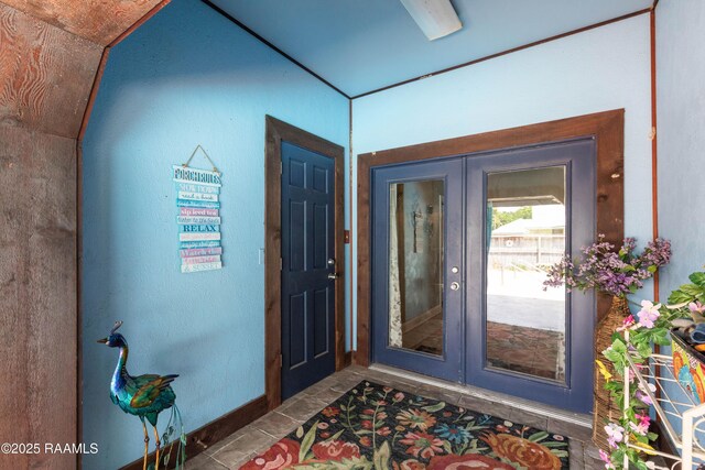 201 Rue Paon, Youngsville, LA 70592 - foyer with french doors and baseboards