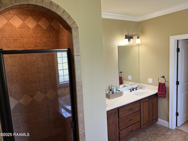 277 Carrera Ln, Eunice, LA 70535 - bathroom featuring ornamental molding, double vanity, tile patterned floors, and a shower stall