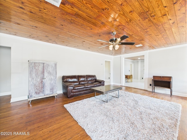 1206 Kaliste Saloom Rd, Lafayette, LA 70508 - living room with wood ceiling, a ceiling fan, wood finished floors, baseboards, and ornamental molding