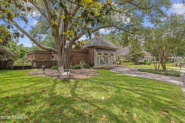 315 Kings Rd, Lafayette, LA 70503 - view of green lawn featuring french doors