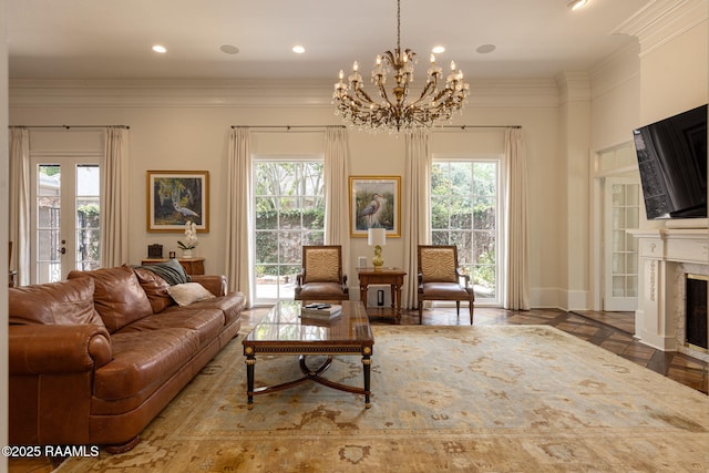 315 Kings Rd, Lafayette, LA 70503 - living area featuring a chandelier, healthy amount of natural light, a premium fireplace, crown molding, and recessed lighting
