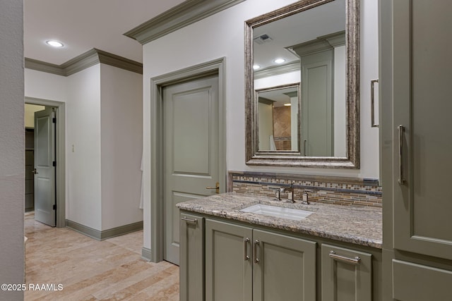 315 Kings Rd, Lafayette, LA 70503 - bathroom featuring ornamental molding, decorative backsplash, vanity, baseboards, and recessed lighting