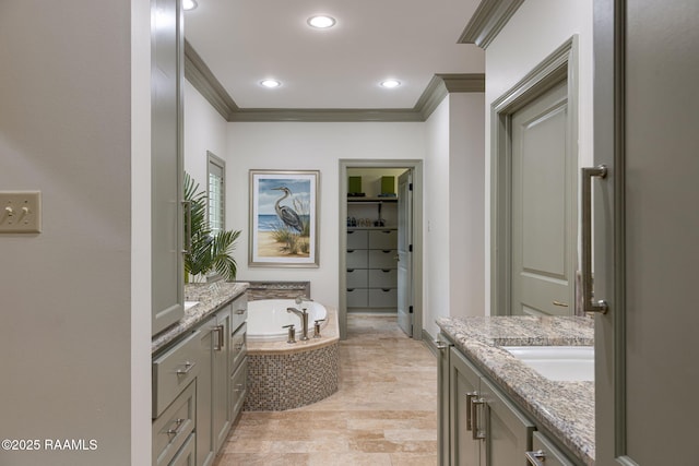 315 Kings Rd, Lafayette, LA 70503 - full bathroom featuring ornamental molding, two vanities, a bath, a walk in closet, and recessed lighting