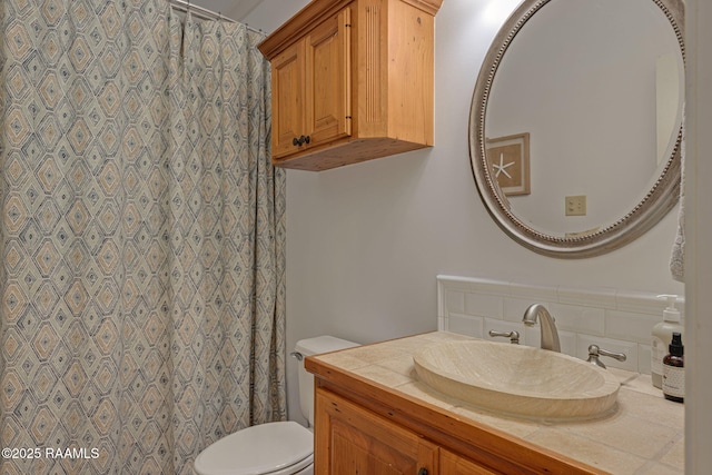 315 Kings Rd, Lafayette, LA 70503 - full bathroom featuring toilet, vanity, and a shower with shower curtain