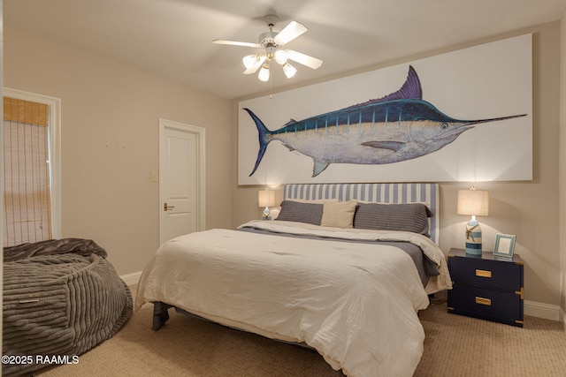 315 Kings Rd, Lafayette, LA 70503 - bedroom with carpet floors, baseboards, and ceiling fan