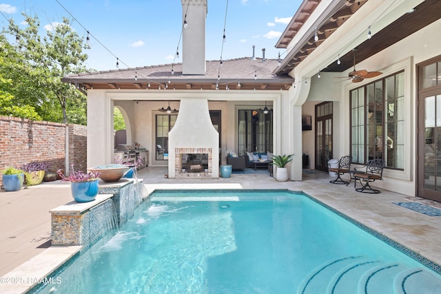 408 Princeton Woods Loop, Lafayette, LA 70508 - view of pool with a ceiling fan, an outdoor living space with a fireplace, and a patio area