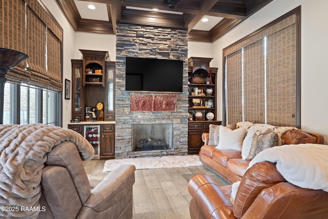 408 Princeton Woods Loop, Lafayette, LA 70508 - living area featuring wine cooler, ornamental molding, light wood-type flooring, beamed ceiling, and a fireplace