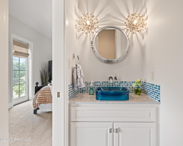 408 Princeton Woods Loop, Lafayette, LA 70508 - bathroom featuring vanity and connected bathroom