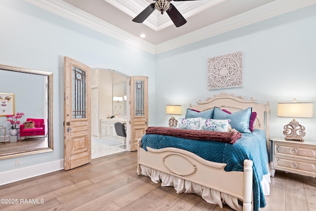 408 Princeton Woods Loop, Lafayette, LA 70508 - bedroom featuring wood finished floors, crown molding, ensuite bathroom, recessed lighting, and arched walkways