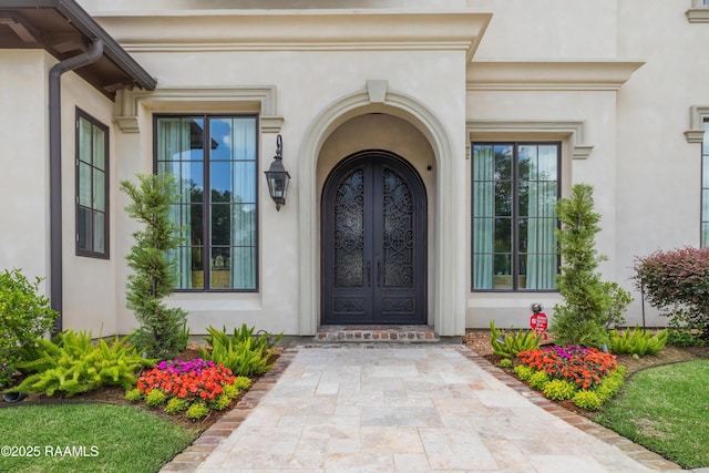 408 Princeton Woods Loop, Lafayette, LA 70508 - property entrance featuring stucco siding and french doors