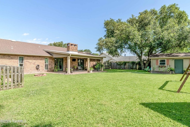 109 Bellevedere Ave, Lafayette, LA 70503 - view of yard featuring a patio