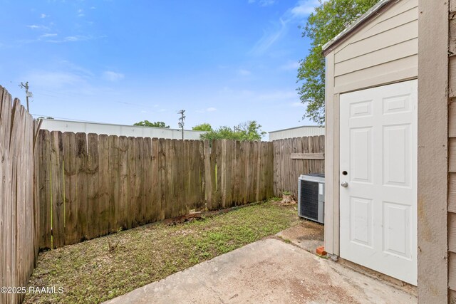 116 Southfield Pkwy, Lafayette, LA 70506 - fenced backyard featuring a patio and central AC