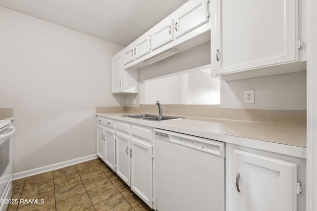 116 Southfield Pkwy, Lafayette, LA 70506 - kitchen featuring dishwasher, a sink, light countertops, and white cabinetry
