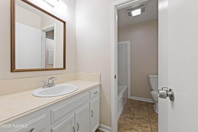 116 Southfield Pkwy, Lafayette, LA 70506 - bathroom featuring toilet, vanity, baseboards, a tub to relax in, and a shower