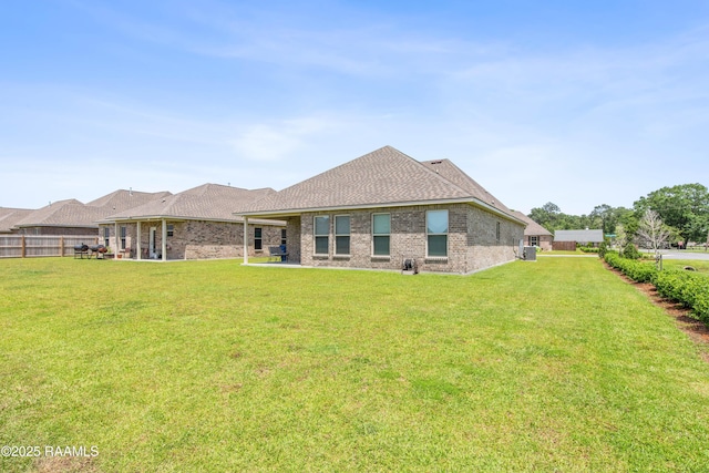 101 Micah Edward, Maurice, LA 70555 - back of house featuring brick siding and roof with shingles