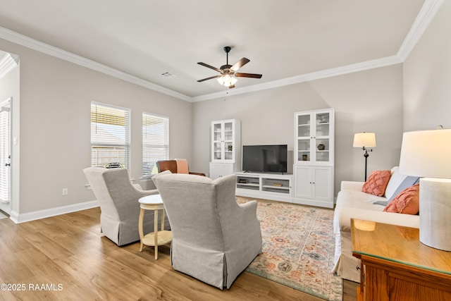 101 Micah Edward, Maurice, LA 70555 - living area featuring light wood-type flooring, ornamental molding, a ceiling fan, and baseboards