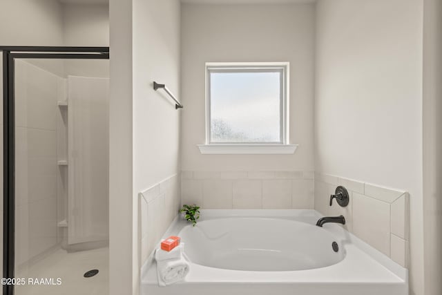 101 Micah Edward, Maurice, LA 70555 - bathroom featuring a garden tub and a shower stall