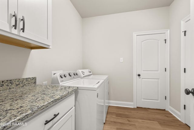 101 Micah Edward, Maurice, LA 70555 - laundry room with cabinet space, independent washer and dryer, light wood-type flooring, and baseboards