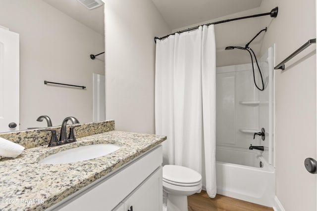 101 Micah Edward, Maurice, LA 70555 - bathroom featuring vanity, wood finished floors, shower / tub combo, and toilet