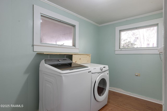 308 Boas Ave, New Iberia, LA 70563 - laundry room featuring independent washer and dryer, wood finished floors, crown molding, and baseboards