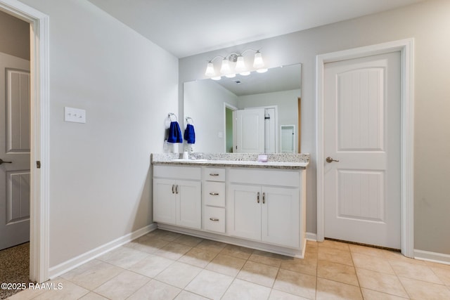 7014 Acacia Lake Dr, Maurice, LA 70555 - full bath with baseboards, double vanity, and tile patterned flooring
