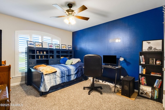 7014 Acacia Lake Dr, Maurice, LA 70555 - carpeted bedroom with baseboards and ceiling fan