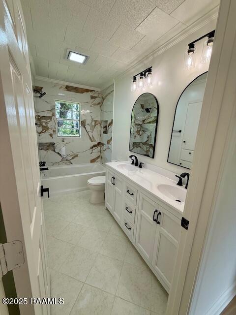 full bathroom with toilet, ornamental molding, washtub / shower combination, double vanity, and tile patterned floors