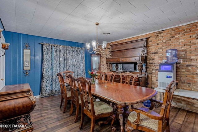 1005 Tensas Dr, Opelousas, LA 70570 - dining room with hardwood / wood-style floors and a chandelier