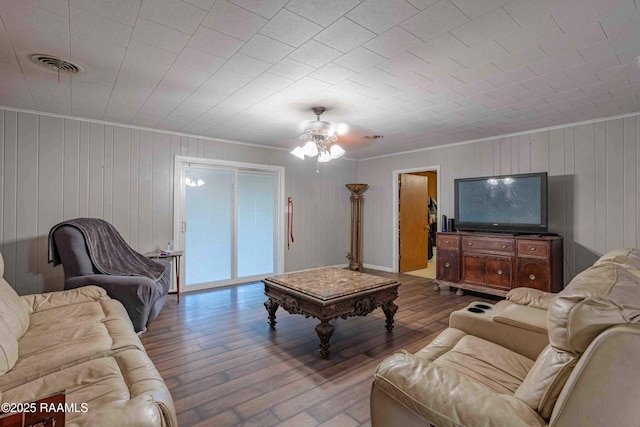1005 Tensas Dr, Opelousas, LA 70570 - living area with ornamental molding, wood finished floors, and ceiling fan