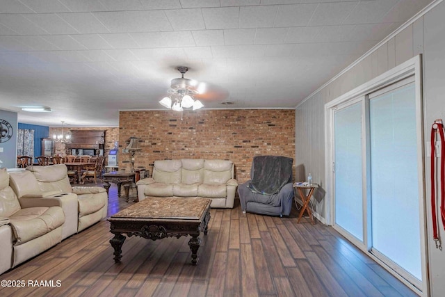 1005 Tensas Dr, Opelousas, LA 70570 - living room with wood finished floors, ceiling fan, crown molding, and healthy amount of natural light