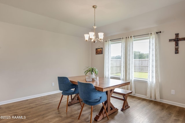 110 Casa Bella Ct, Breaux Bridge, LA 70517 - dining room featuring a chandelier and wood finished floors