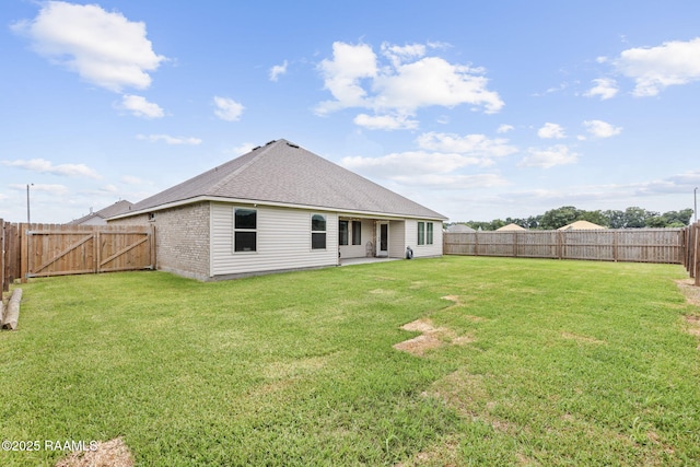 110 Casa Bella Ct, Breaux Bridge, LA 70517 - back of property featuring a fenced backyard, brick siding, and a shingled roof